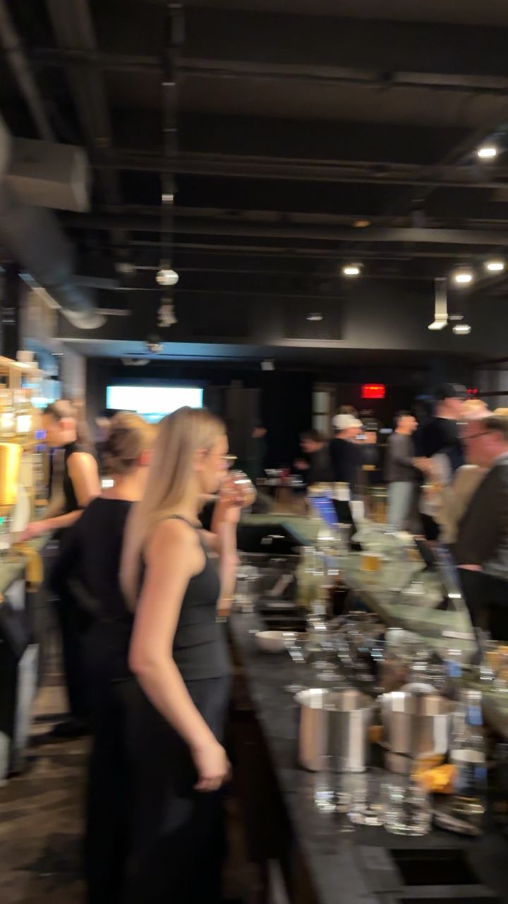 Guests at the bar at a Barsys private event